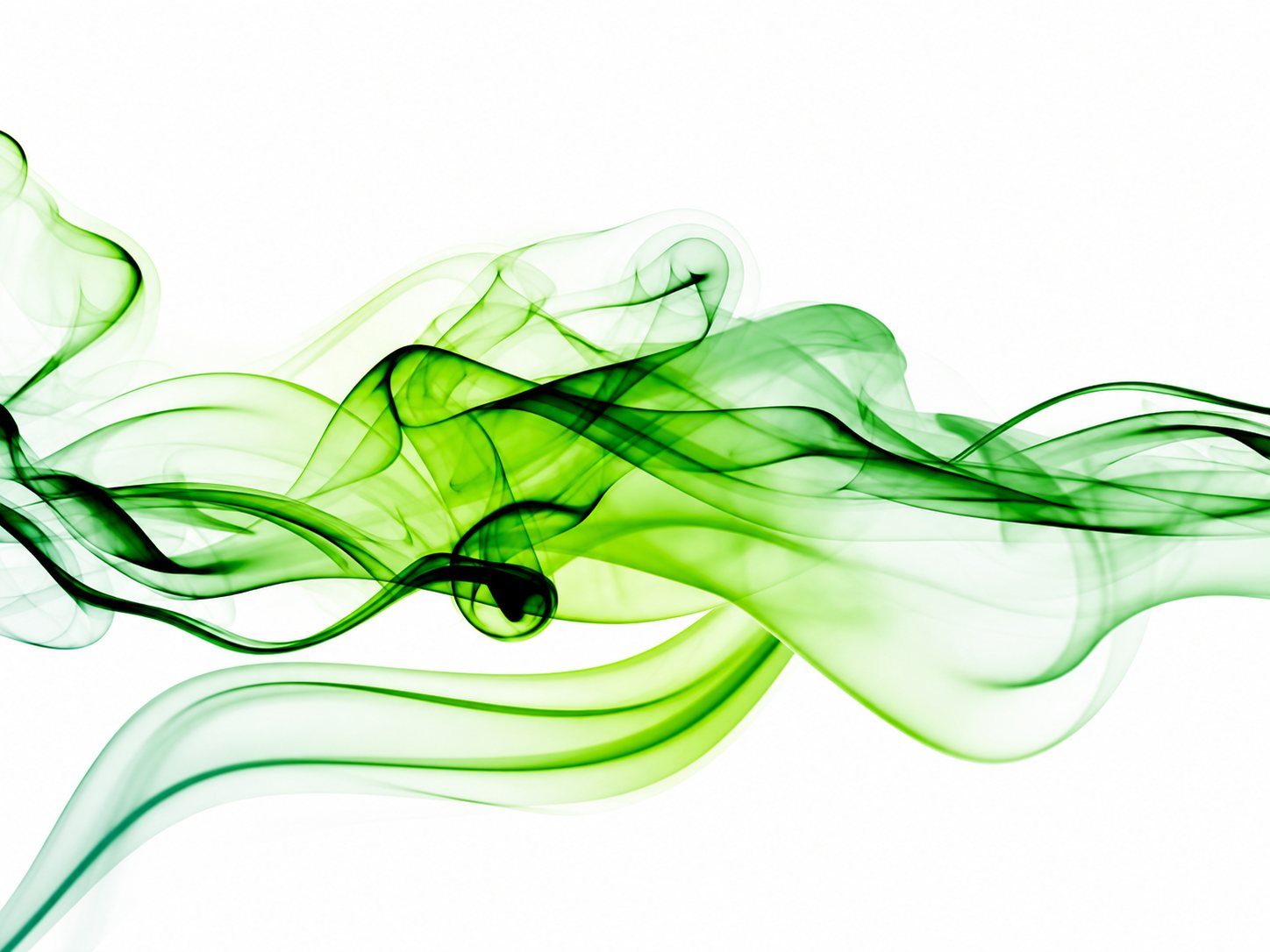 Volutes de fumée verte sur fond blanc